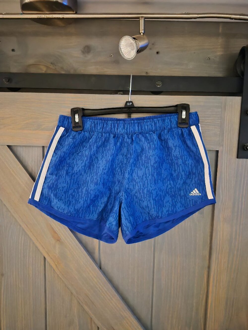 Blue adidas shorts (youth size large)